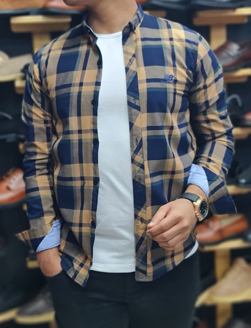 أبو عمار للملابس الشبابي والكوتشيات
